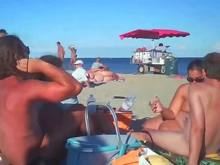 Milf Blows Her boyfriend On Nude Beach By Voyeurs