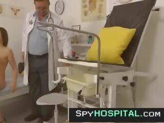 Beautiful eighteen checked by old gyno doc hidden cam